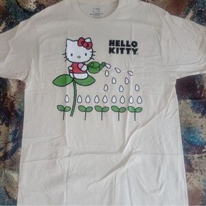 SANRIO Hello Kitty Beige Color Graphic T-Shirt Size Large Watering Plants NEW